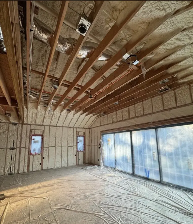 Interior walls and ceiling insulated with spray foam during new construction in Bridgeport
